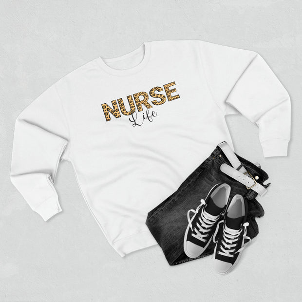 White Sweater for nurses with word nurse in  leopard print with life in black print underneath