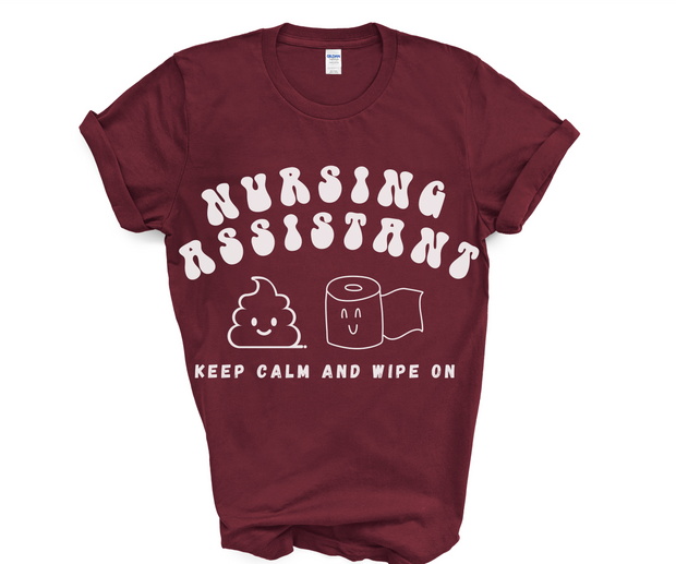 maroon shirt nursing assistant tshirt with words nursing assistant in half circle at top and stool and toilet paper roll emoji in middle with smiling faces and the words keep calm and wipe on at the bottom
