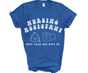 royal blue shirt nursing assistant tshirt with words nursing assistant in half circle at top and stool and toilet paper roll emoji in middle with smiling faces and the words keep calm and wipe on at the bottom