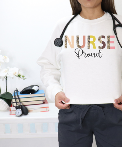 Sweater for registered nurses with word nurse in  leopard and color print with proud in black print below