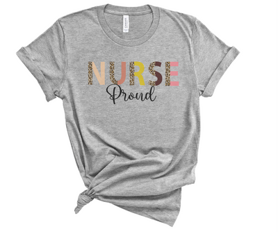 Grey Nurse shirt with leopard color print saying nurse and proud beneath in black writing short sleeve shirt for nurses, front